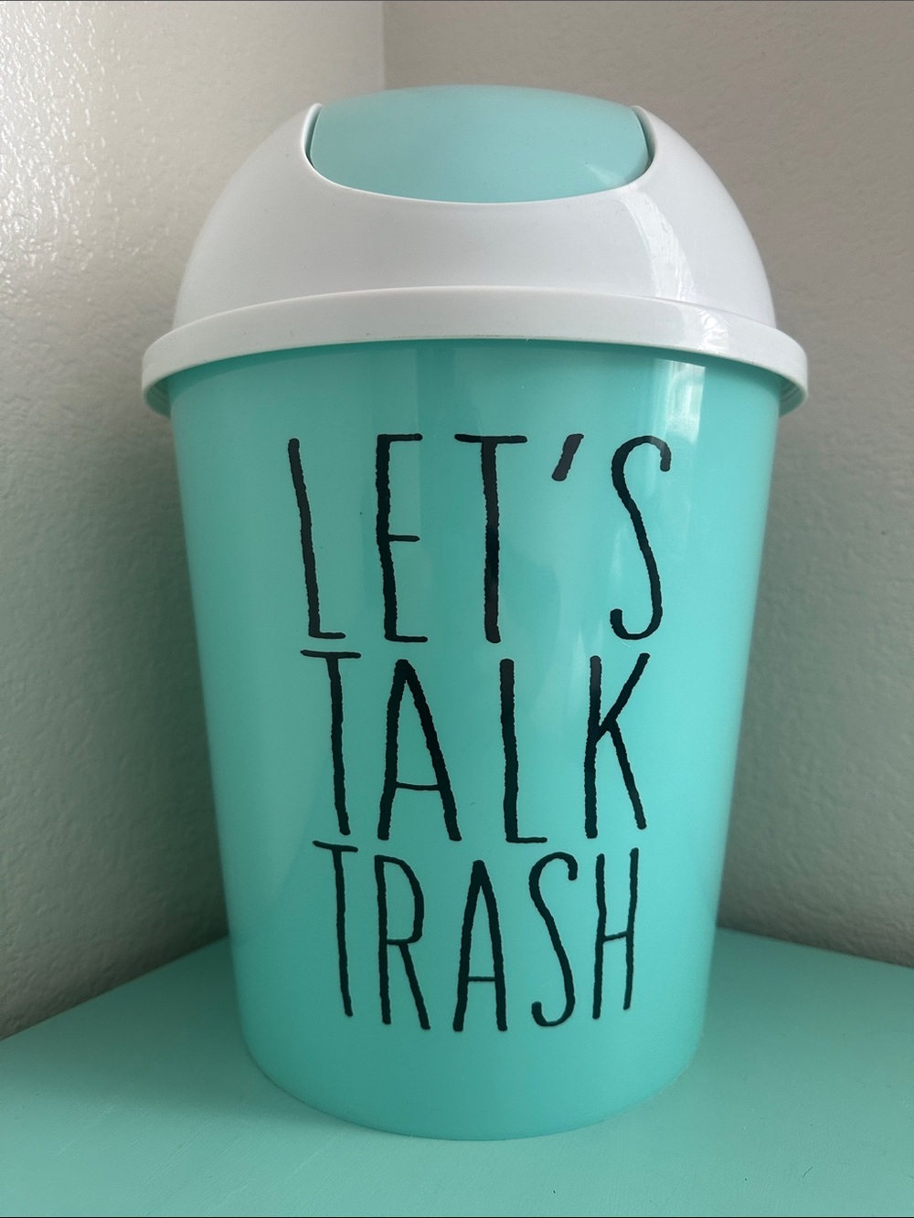 Essential Home Designs-basic plastic trash can with swinging top-new